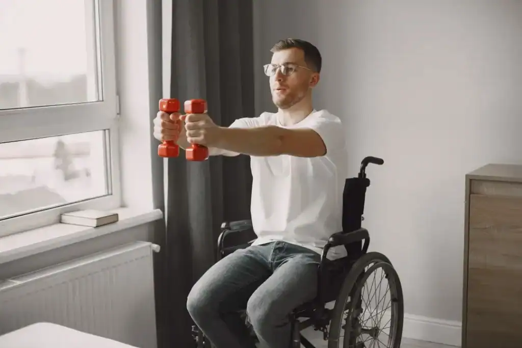 Empowering Weight Loss: A Comprehensive Guide for Individuals with Disabilities 1 Image of man doing exercise in his wheelchair to aid weight loss Romford